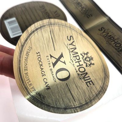 High-end rode wijnfles verpakking vinyl sticker met brons label voor whisky sap